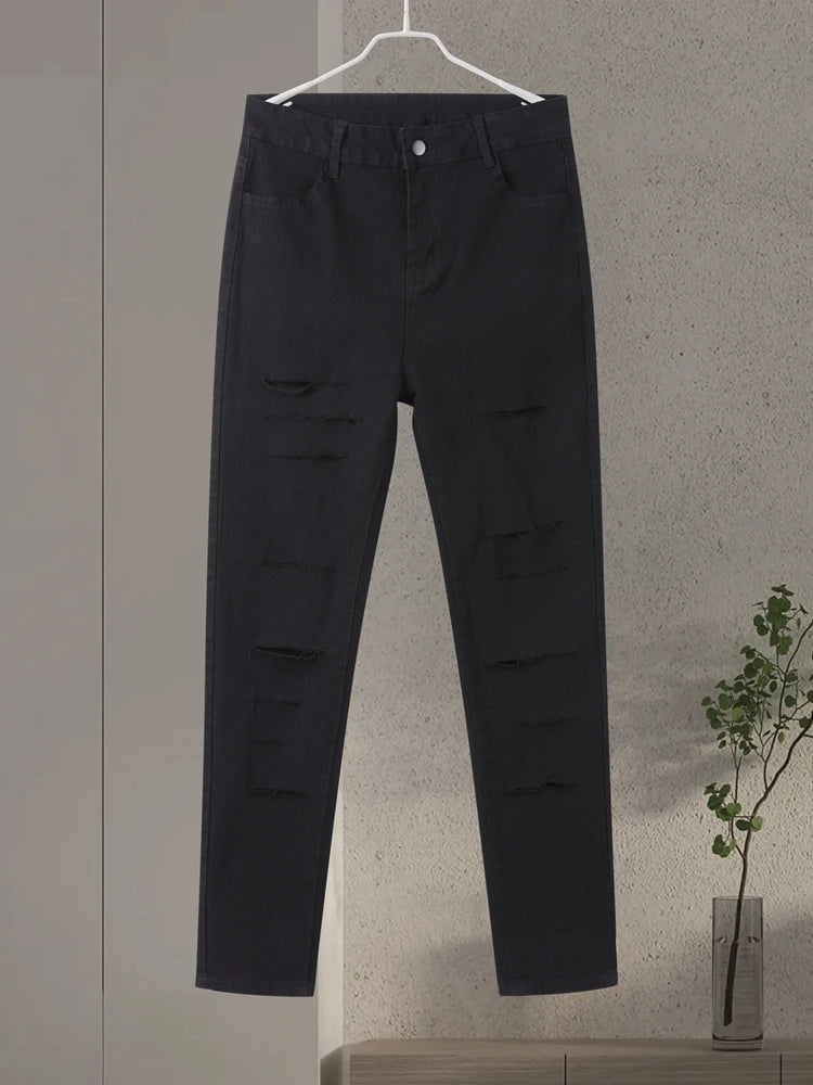 High Waist Ripped Skinny Jeans – Schwarze Denim mit Cut-Outs